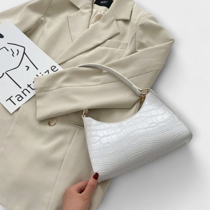 Aurora. - Glänzende Ledertasche